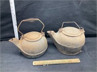 2 cast iron kettles