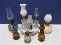 8 small oil lamps