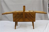 Wood sewing box on legs including contents,