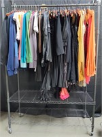 Rack of designer clothes: Armani, Dolce &