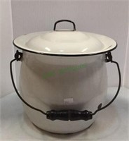 Enamel slop bucket with lid and swivel handle.