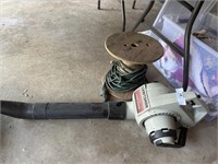 Extension cord and electric blower