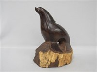 FIGURE OF A HANDCARVED SEA LION: