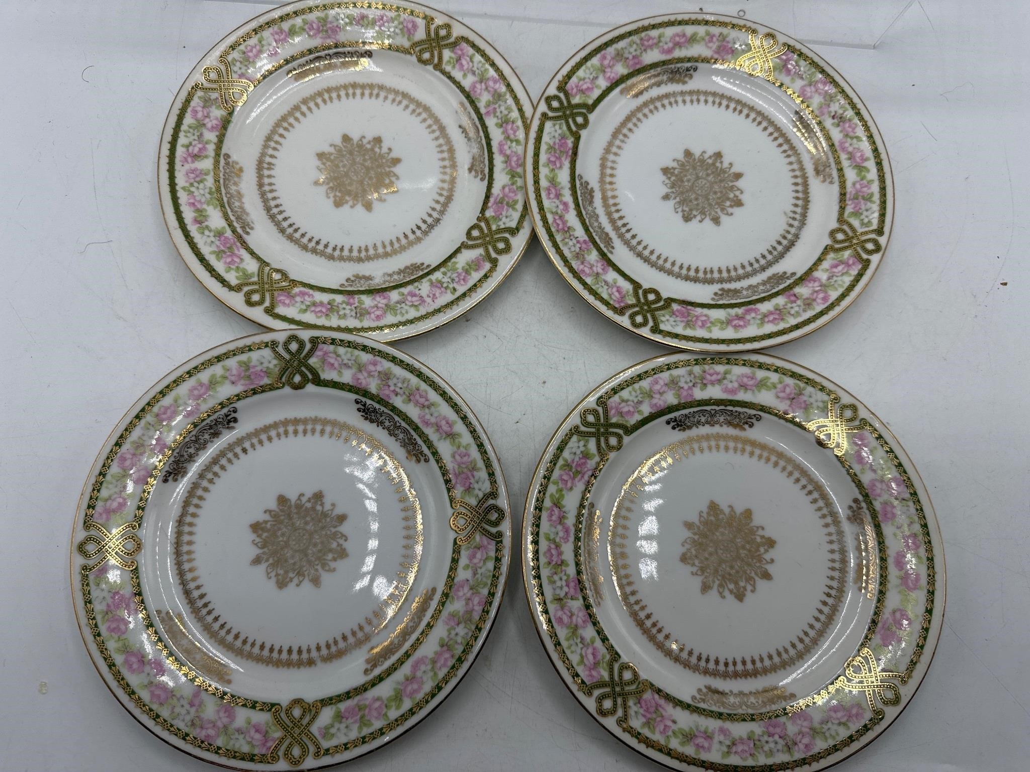 Set of 4 Austria porcelain bread plates