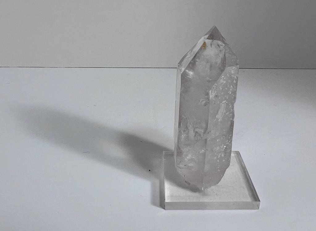 Clear Quartzÿ Crystal on its stand