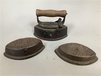 Three Cast Iron Sad Irons and One Handle