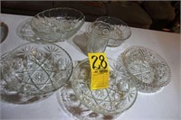 5 glass bowls; small pitcher