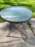 Wrought Iron Glass Topped Folding Patio Table.