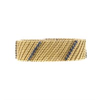 A Wide 18K Braided Bracelet with Sapphires