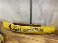 leinie’s honey Weiss yellow wood canoe