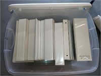 2 containers full of binders