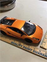 Expensive orange car -- nice model cheap