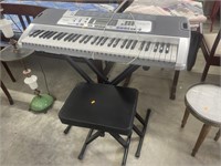 Casio keyboard w/ stand and still