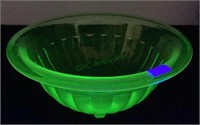 Green uranium glass mixing bowl that’s 7 1/2