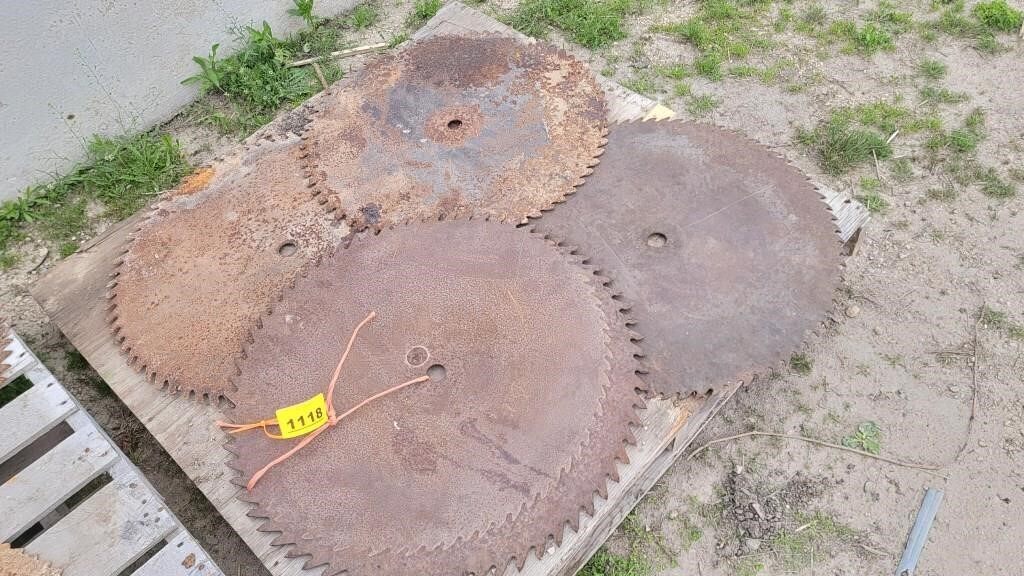 Four large saw blades