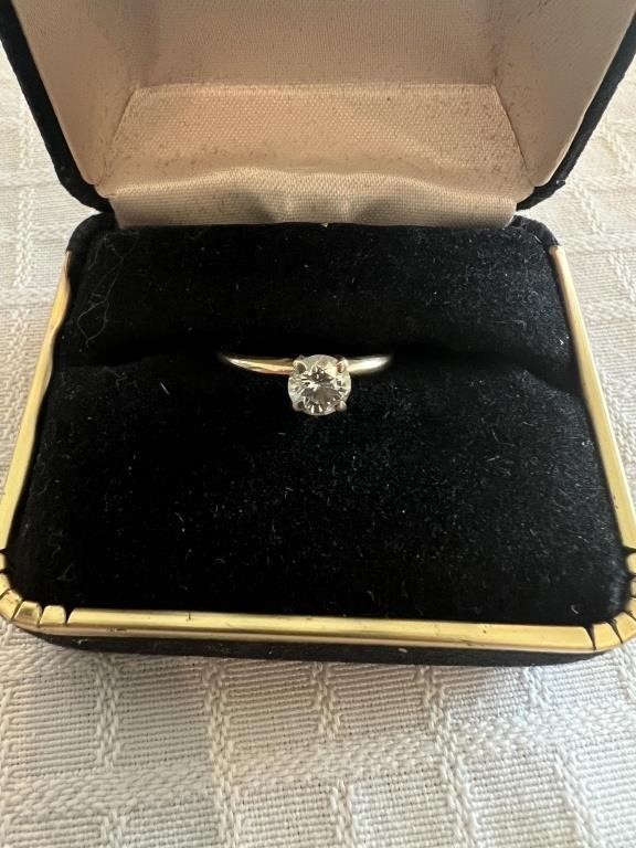 Clear stone engagement ring marked 14K DA-A