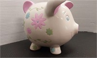 Adorable vintage piggy bank w/stopper. A few