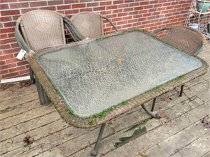 PATIO TABLE (GLASS TOP) AND 6 CHAIRS