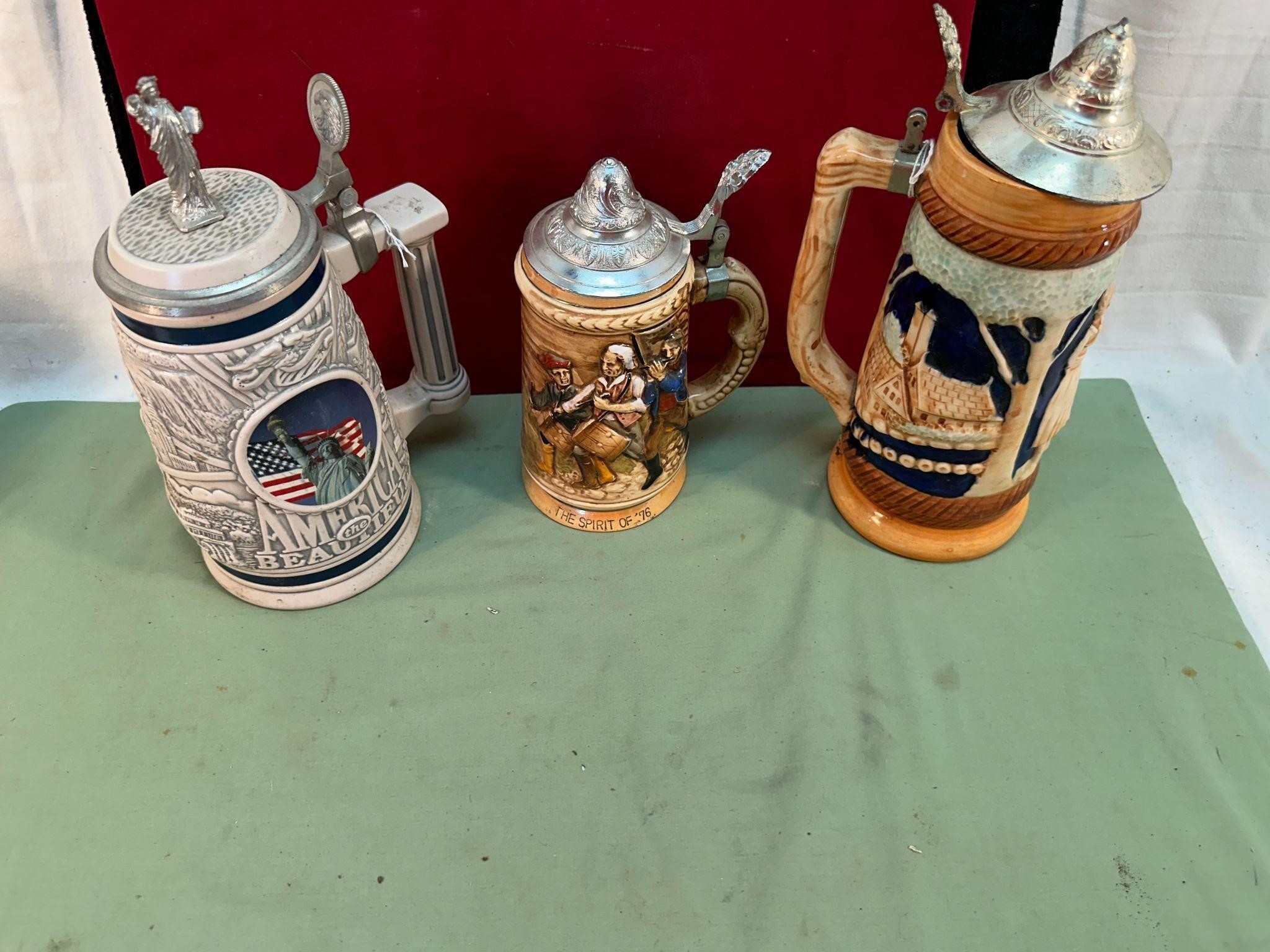 3 STEINS WITH LIDS