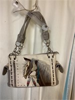 G) beautiful embroidered horse handbag, possibly
