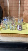 Tray of Mickey Mouse themed glass cups