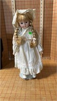 Doll on stand