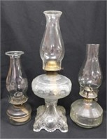 3 antique glass kerosene lamps, tallest is 19"