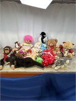 Large assortment of plush animals and vintage