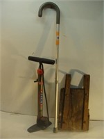 Cane, Tire Pump and Rustic Piece