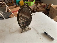 Antique oval swivel mirror