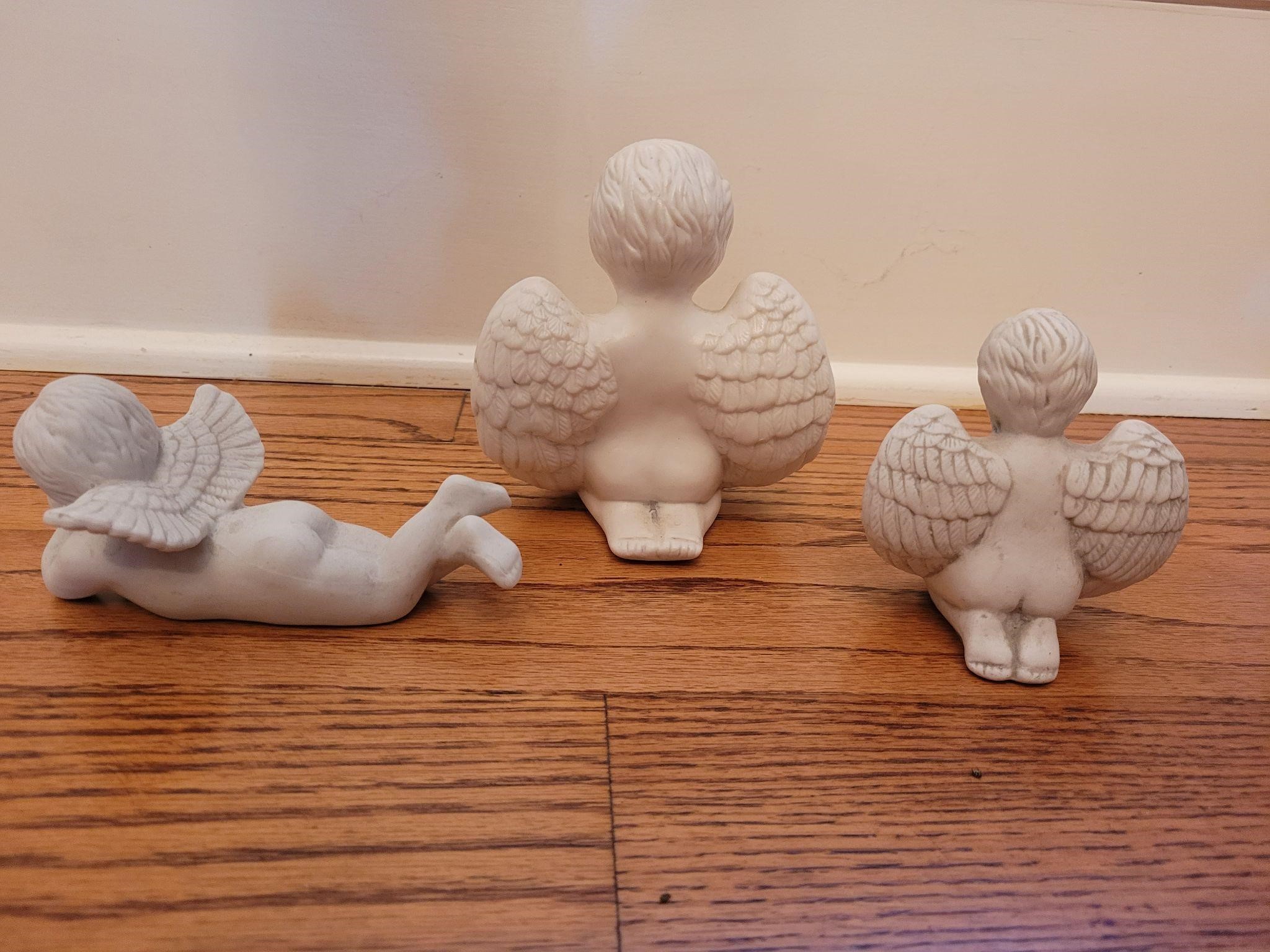 Three Angel Porcelain Figurines