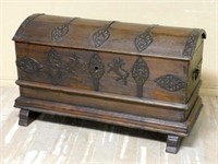 Ornate Hammered Iron Accented Oak Dome Top Trunk.
