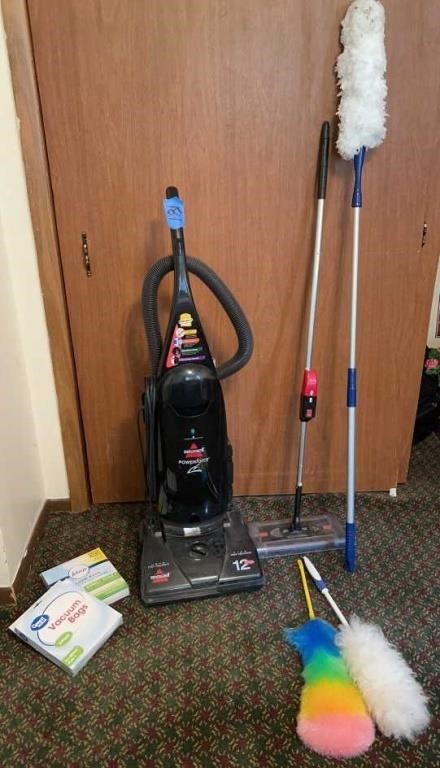 Bissell vacuum with bags , dusters and swivel