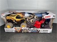 (3) MONSTER JAM SHAKE-N-QUAKE MONSTER TRUCKS