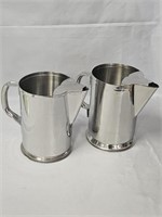 TWO STAINLESS STEEL PITCHERS 7 ¼"