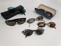 Six Pairs Of Sunglasses And Two Cases