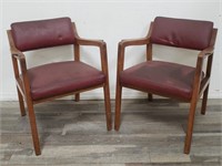 Pair of Dunbar faux leather armchairs