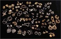 50+ pairs of pierced earrings in various styles