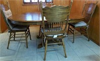 Medium Toned Wood Table and Chairs.