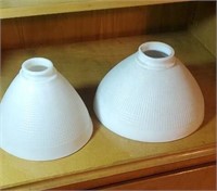 Pair of white glass globes