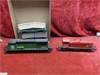 Lionel engines & 2 rolling stock cars.