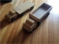 (2)  3 to 7 playways large wooden toy trucks