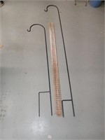 Two metal plant hangers