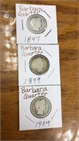 3 Barber quarter coins. 1897, 1899, 1904
