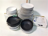 White stoneware plates, bowls, dessert plates
