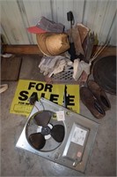 Fan, milk crate, signs, golf shoes, etc