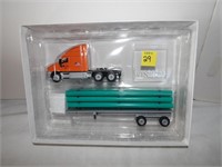 Winross Yourga Trucking Flatbed w/Pipe Load