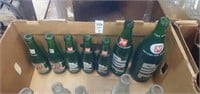 Lot of 7 up bottles