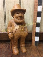 Hand carved man with top hat/cane