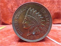 1877 Indian head cent coin bank.
